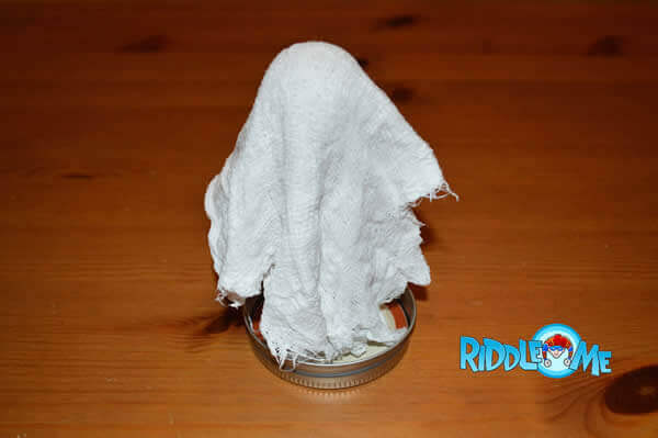 Arrange cloth for ghost in a jar